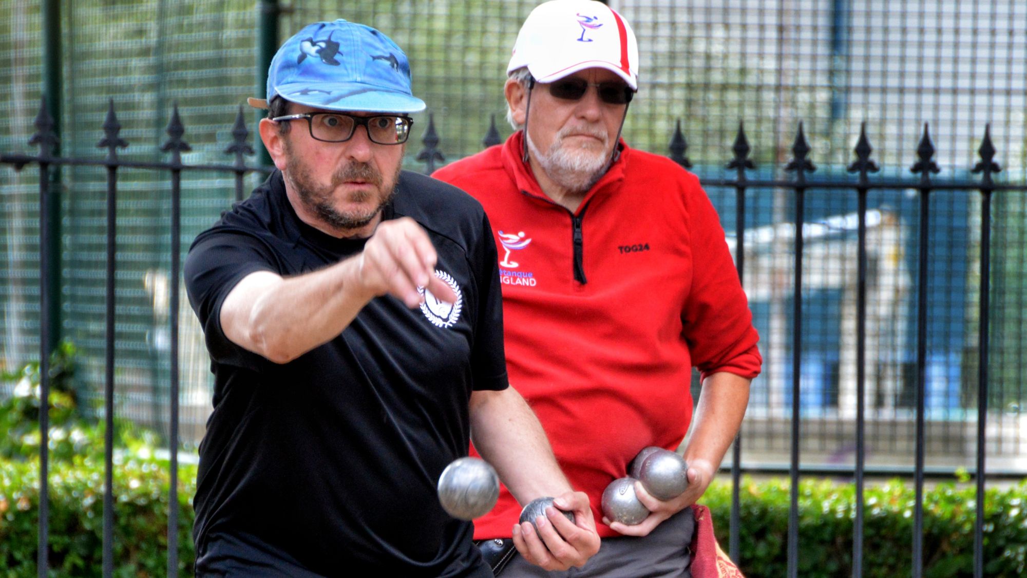 Pétanque player throwing a boule